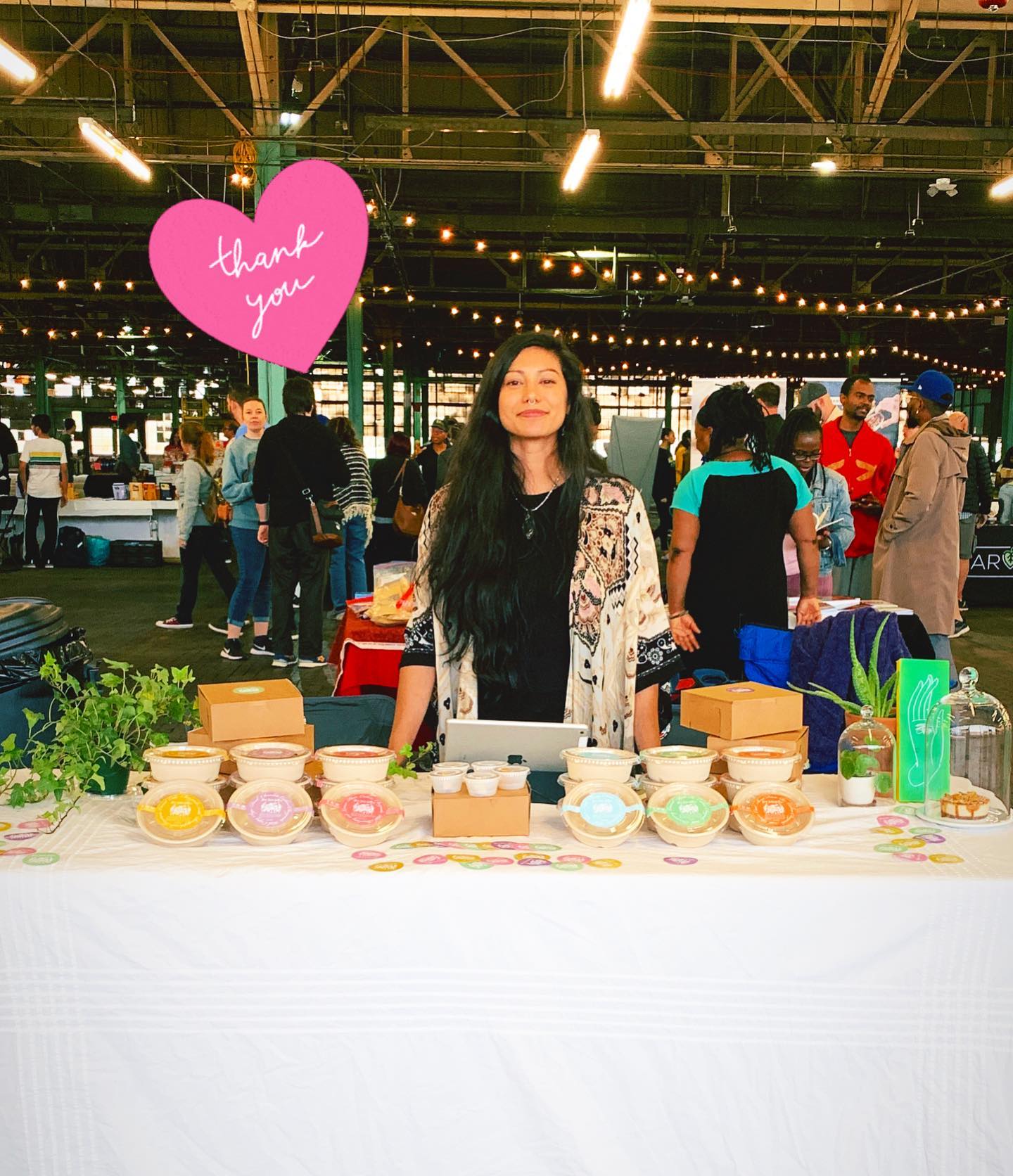 Tiffany, Founder of Cakey Organics, at a market stall
